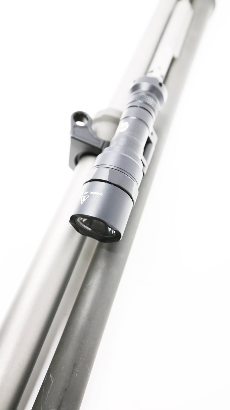 The FFT Benelli M4 / M1014 Multi-Light Flashlight Mount with 1913 Rail, Scout Pro Attachment, and Locking QD Swivel