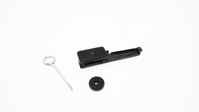 The FFT Oversized Bolt Release Button in Black or NP3